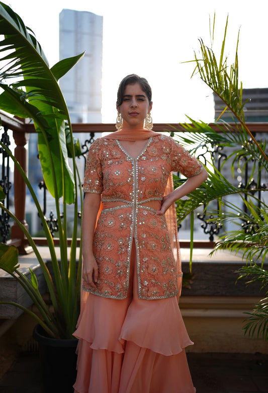 Embroidered kurta paired with a layered sharara pant.